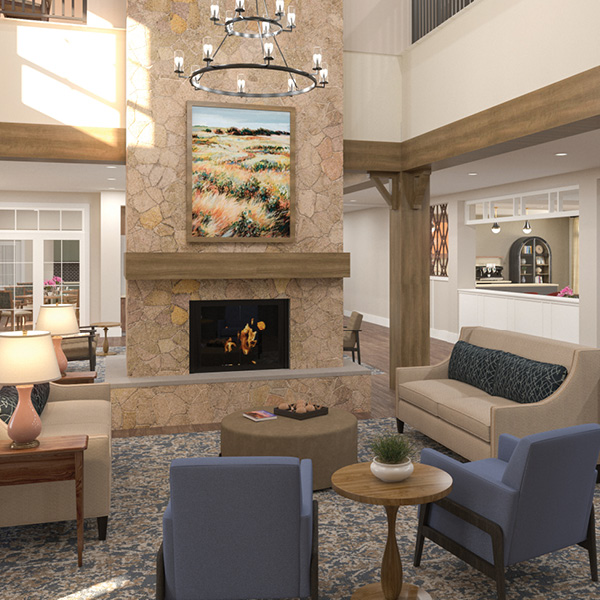 Foyer with comfortable seating and a fireplace